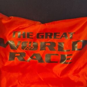 Bright Red Graphic String Backpack with Black Lettering Great World Race